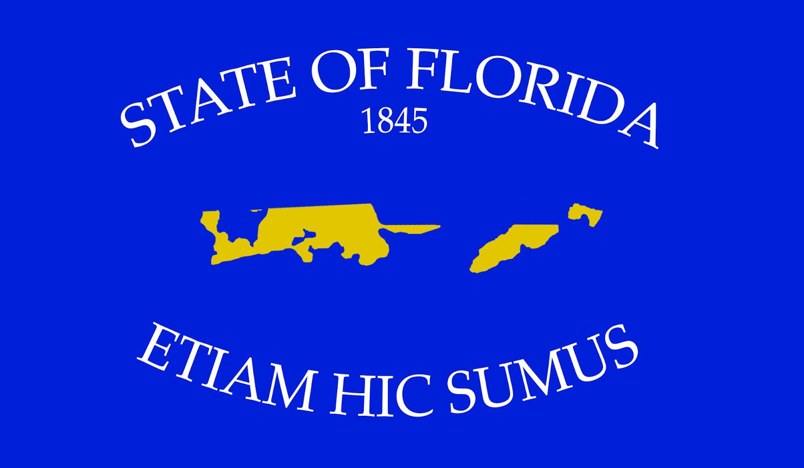 Florida’s new state flag, which includes a map of the small remaining portions that haven’t been covered by flood waters. The motto reads, “ETIAM HIC SUMUS.”