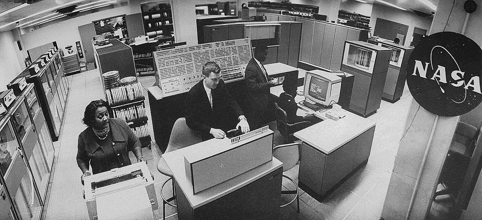 1960s photo of NASA office employees.